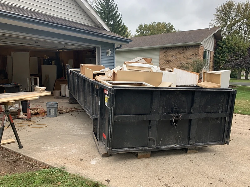Kitchen remodel debris ready for a dumpster in Bowling Green, KY